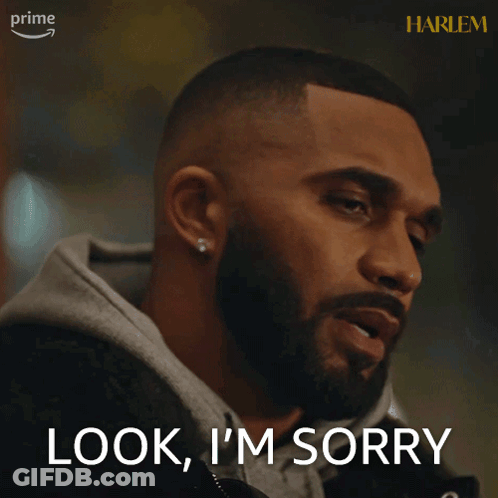 A Man With A Beard Says " Look I 'M Sorry " On A Screen GIF