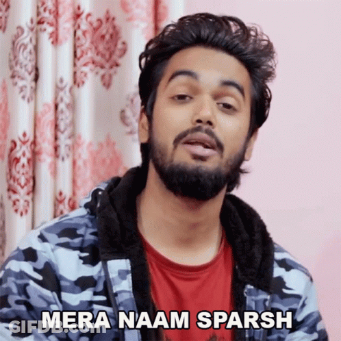A Man With A Beard Says Mera Naam Sparsh In Front Of A Pink Curtain GIF