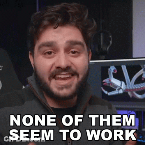 A Man With A Beard Says " None Of Them Seem To Work " In Front Of A Computer Monitor GIF