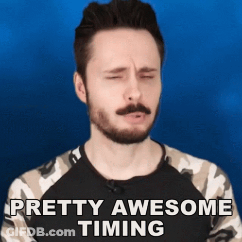 A Man With A Beard Says Pretty Awesome Timing With His Eyes Closed GIF
