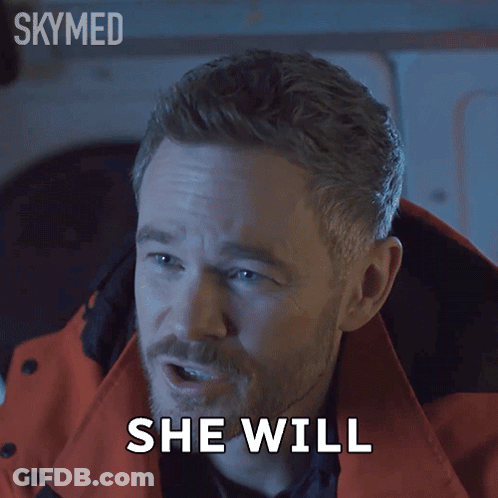 A Man With A Beard Says She Will In Front Of A Skymed Logo GIF