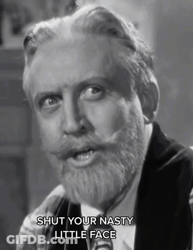 A Man With A Beard Says Shut Your Nasty Little Face In A Black And White Photo GIF