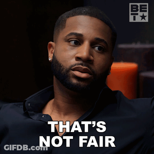 A Man With A Beard Says " That 'S Not Fair " In White Letters GIF
