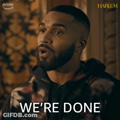 A Man With A Beard Says We 'Re Done In Front Of A Harlem Poster GIF