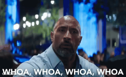 A Man With A Beard Says Whoa Whoa Whoa Whoa In Front Of A Blurry Background GIF