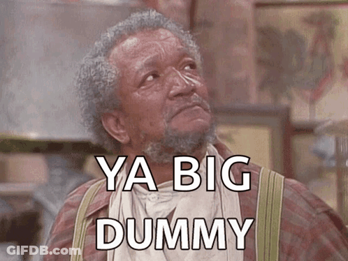 A Man With A Beard Says Ya Big Dummy In Front Of Him GIF