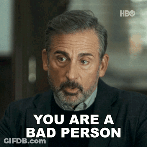 A Man With A Beard Says " You Are A Bad Person " While Wearing A Suit GIF