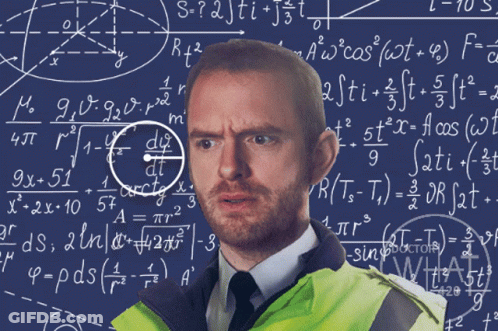 A Man With A Beard Stands In Front Of A Blue Board With Math Equations GIF