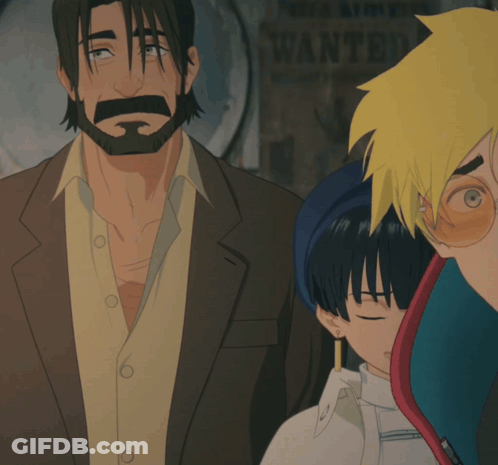 A Man With A Beard Stands In Front Of A Sign That Says Wan On It GIF