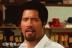 A Man With A Beard Sticking Out His Tongue GIF