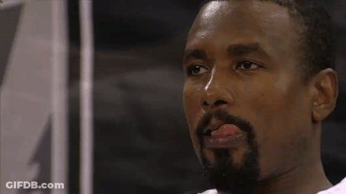 A Man With A Beard Sticks His Tongue Out GIF