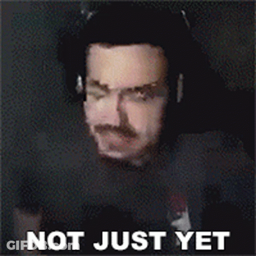 A Man With A Beard Takes A Selfie And Says " Not Yet " In White Letters GIF