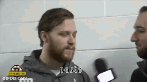A Man With A Beard Talks Into A Microphone And The Word Pasta Is Visible GIF