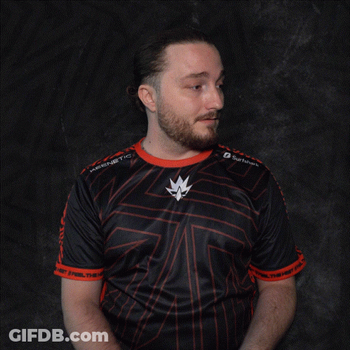 A Man With A Beard Wearing A Black And Red Shirt With A Maple Leaf On The Sleeves GIF