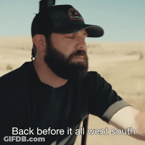 A Man With A Beard Wearing A Black Hat With The Words Back Before It All Went South On The Bottom GIF