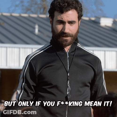 A Man With A Beard Wearing A Black Jacket Says But Only If You F * * King Mean It GIF