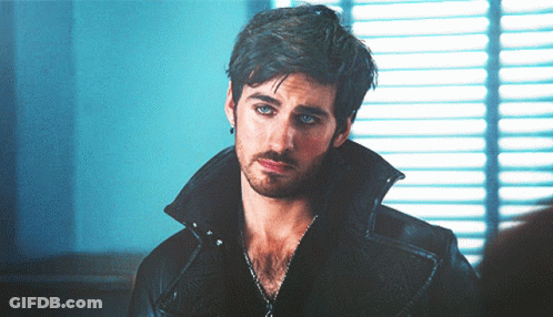 A Man With A Beard Wearing A Black Leather Jacket GIF