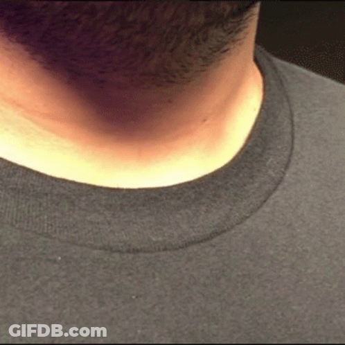 A Man With A Beard Wearing A Black Shirt GIF