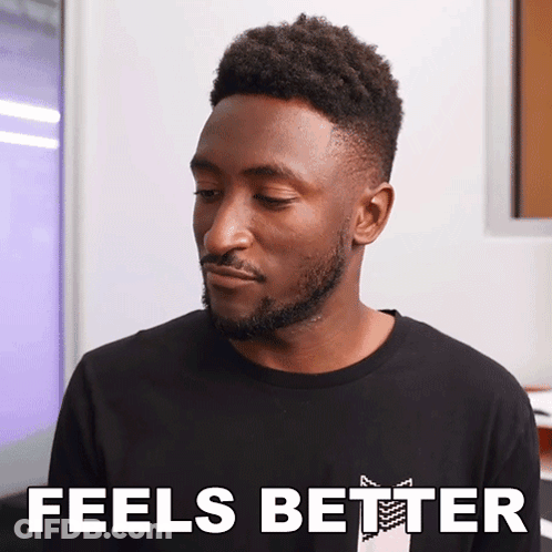 A Man With A Beard Wearing A Black Shirt That Says " Feels Better " GIF