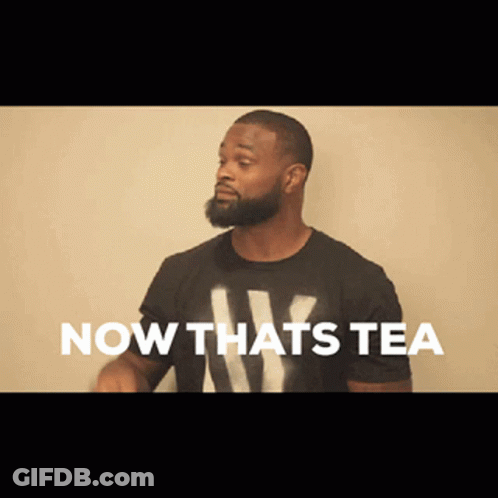 A Man With A Beard Wearing A Black Shirt That Says Now Thats Tea GIF