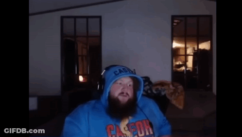 A Man With A Beard Wearing A Blue Casson Hoodie GIF