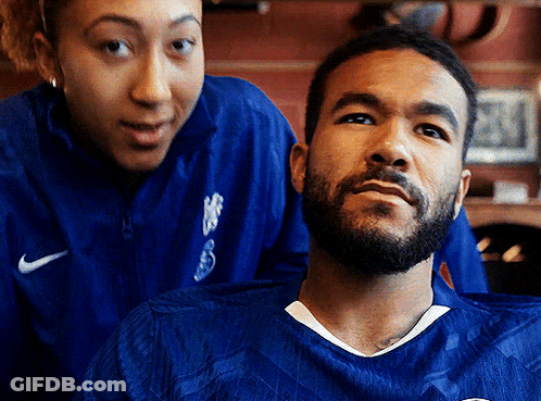 A Man With A Beard Wearing A Blue Nike Shirt GIF