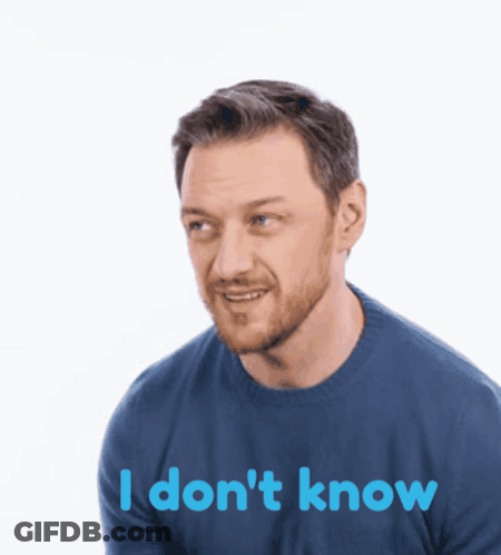 A Man With A Beard Wearing A Blue Shirt That Says " I Don 'T Know " GIF