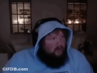 A Man With A Beard Wearing A Blue Shirt That Says Memphis On It GIF