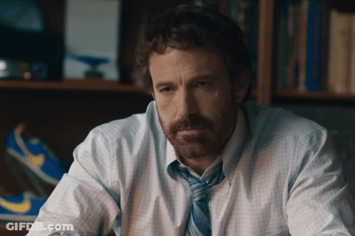 A Man With A Beard Wearing A Blue Tie GIF