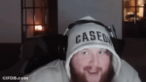 A Man With A Beard Wearing A Cased Hoodie GIF