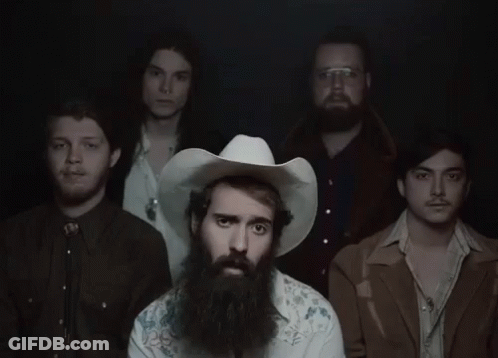 A Man With A Beard Wearing A Cowboy Hat GIF