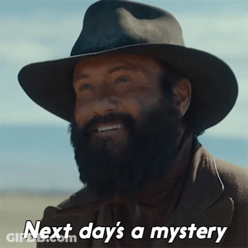 A Man With A Beard Wearing A Cowboy Hat With The Words Next Day 'S A Mystery GIF