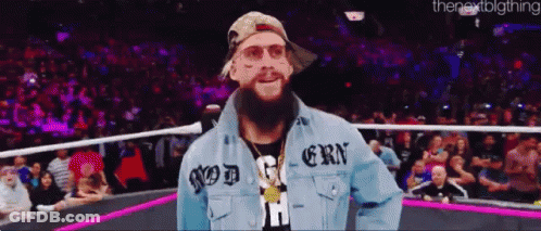 A Man With A Beard Wearing A Denim Jacket That Says God On It GIF