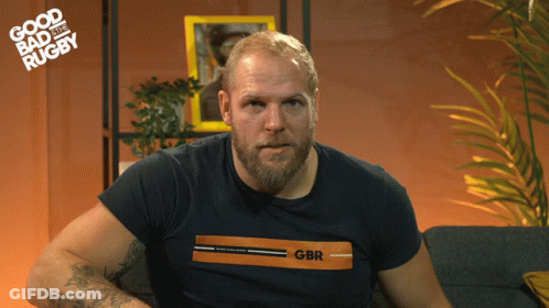 A Man With A Beard Wearing A Gbr Shirt GIF