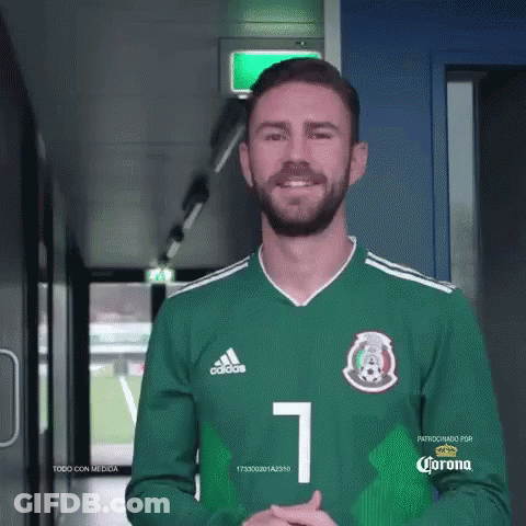 A Man With A Beard Wearing A Green Adidas Jersey With The Number 1 On It GIF