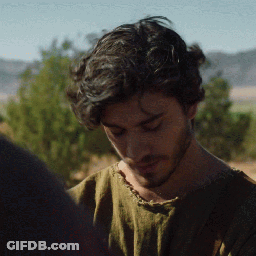 A Man With A Beard Wearing A Green Shirt GIF