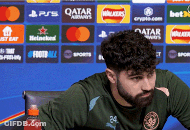 A Man With A Beard Wearing A Green Shirt With The Number 24 On The Front GIF