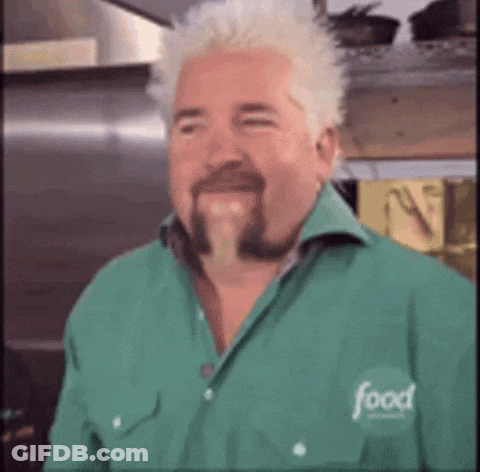 A Man With A Beard Wearing A Green Shirt With The Word Food On It GIF