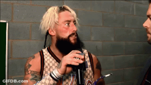 A Man With A Beard Wearing A Gucci Jersey GIF