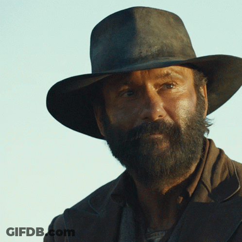 A Man With A Beard Wearing A Hat GIF