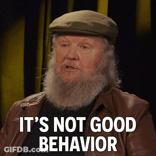 A Man With A Beard Wearing A Hat And A Brown Jacket Says It 'S Not Good Behavior GIF