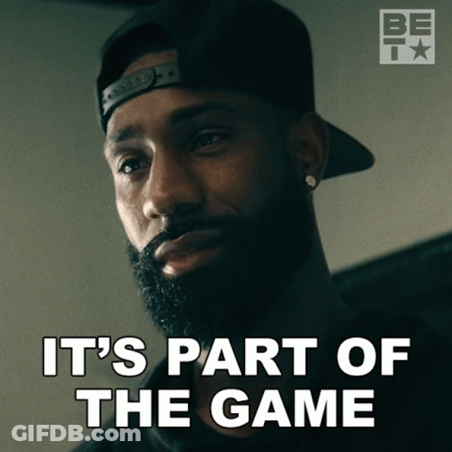A Man With A Beard Wearing A Hat And Earrings Says It 'S Part Of The Game GIF