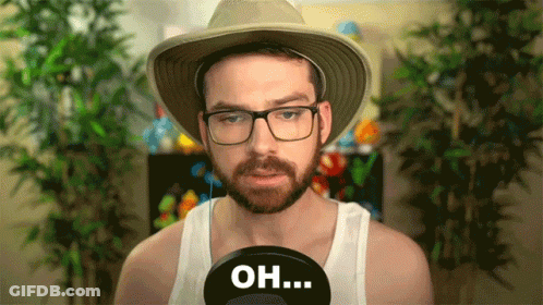 A Man With A Beard Wearing A Hat And Glasses Says " Oh " GIF