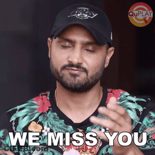 A Man With A Beard Wearing A Hat Says We Miss You GIF