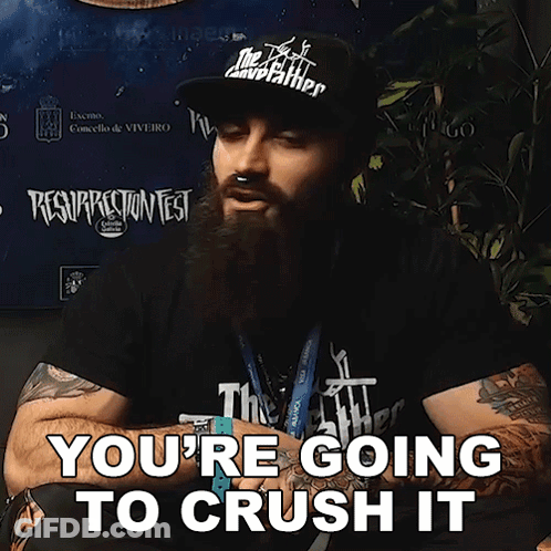 A Man With A Beard Wearing A Hat That Says The Godfather On It GIF