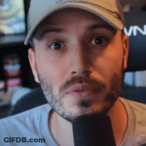 A Man With A Beard Wearing A Hat That Says Vn On It GIF