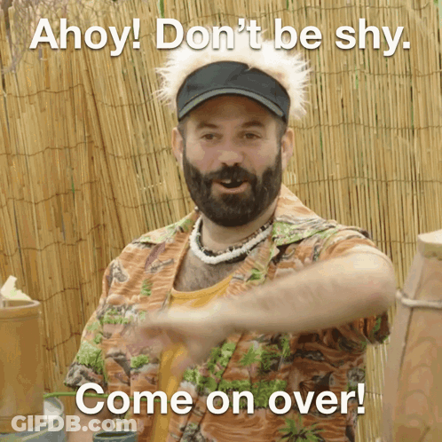 A Man With A Beard Wearing A Hawaiian Shirt Says " Ahoy ! Don 'T Be Shy Come On Over " GIF