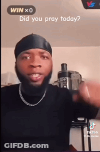 A Man With A Beard Wearing A Headband And A Chain Is Asking If He Prayed Today . GIF