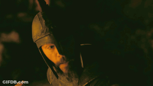 A Man With A Beard Wearing A Helmet With The Words " I Think It 'S Asleep " Below Him GIF