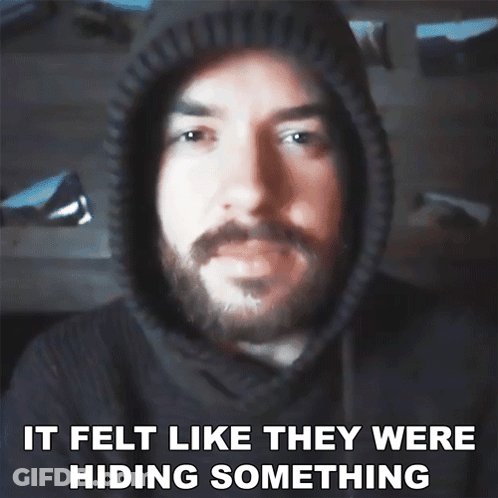 A Man With A Beard Wearing A Hoodie With The Words It Felt Like They Were Hiding Something GIF